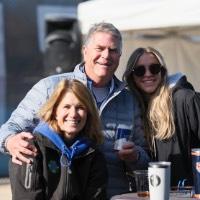 Dad, mom, and daughter at a table